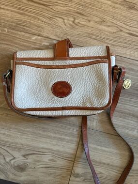 Dooney & Bourke Cream and Tan Pebbled Leather Crossbody